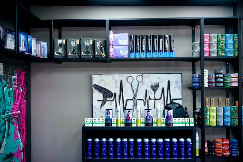 Shelves of hair products and clippers