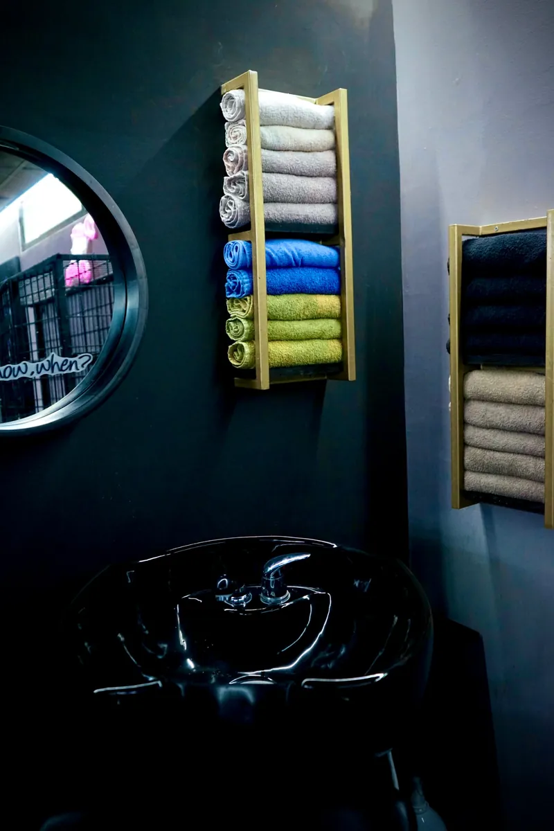 Rolled towels above the wash basin